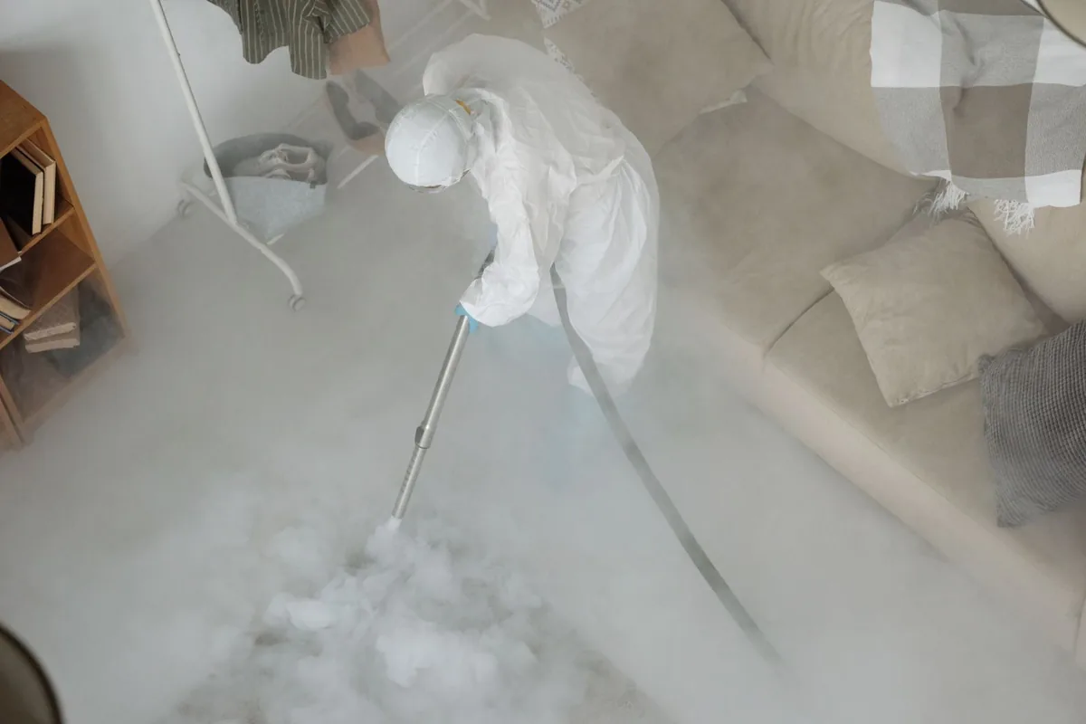 Biohazard cleanup technician in protective equipment, Pine Hills, Atlanta, GA